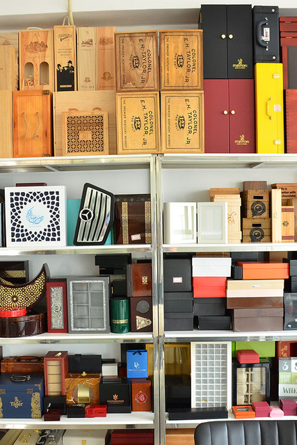 Assortment of custom wine boxes by MC Packaging, ready for shipment
