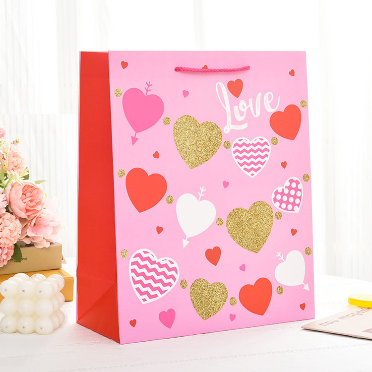 Luxury Brand Custom Logo Gift Paper Bag for Clothes Pink Matte Garment Clothing Boutique Packaging Bags with Ribbon Handles