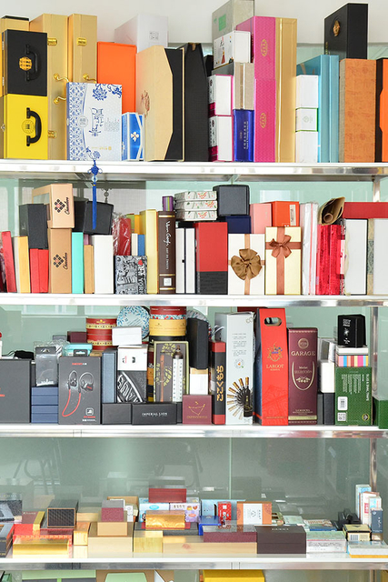Display of custom gift boxes by MC Packaging, showcasing high-quality craftsmanship