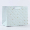 specialty paper embossed ribbon paper bag