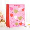 Luxury Brand Custom Logo Gift Paper Bag for Clothes Pink Matte Garment Clothing Boutique Packaging Bags with Ribbon Handles